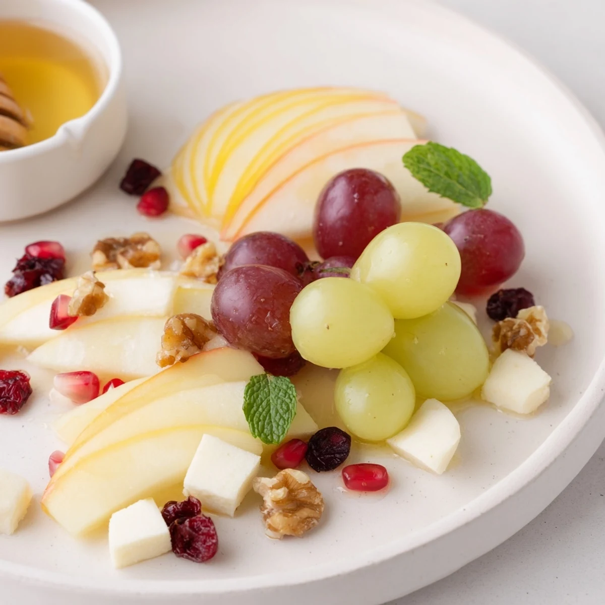 A gorgeous Apple Orchard Fruit Board with crisp apple slices and vibrant grapes ready to enjoy.