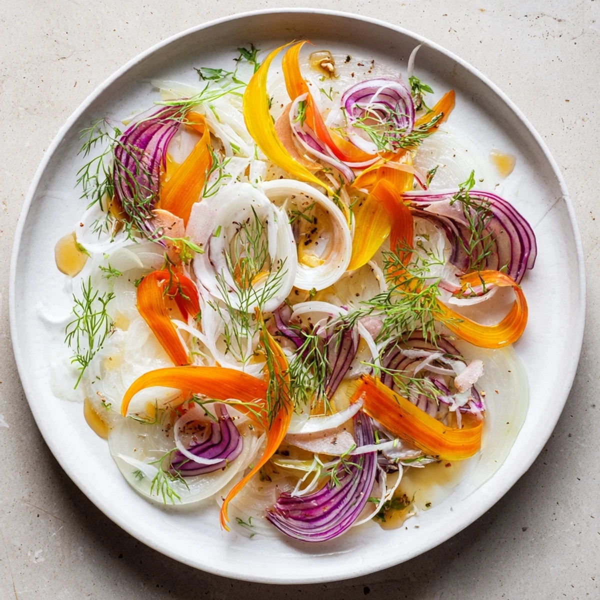 The Spinning Top salad, colorful shaved vegetables arranged in a dynamic, circular pattern.