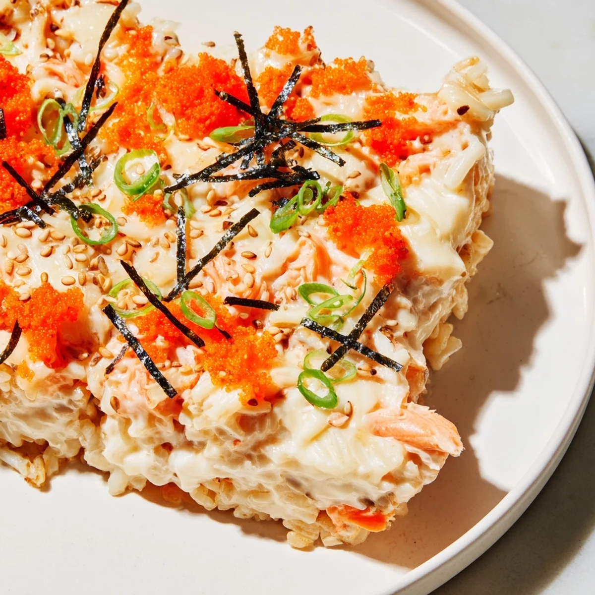 Mouthwatering close-up of Creamy Salmon Sushi Bake showcasing a rich, layered texture and inviting aroma.
