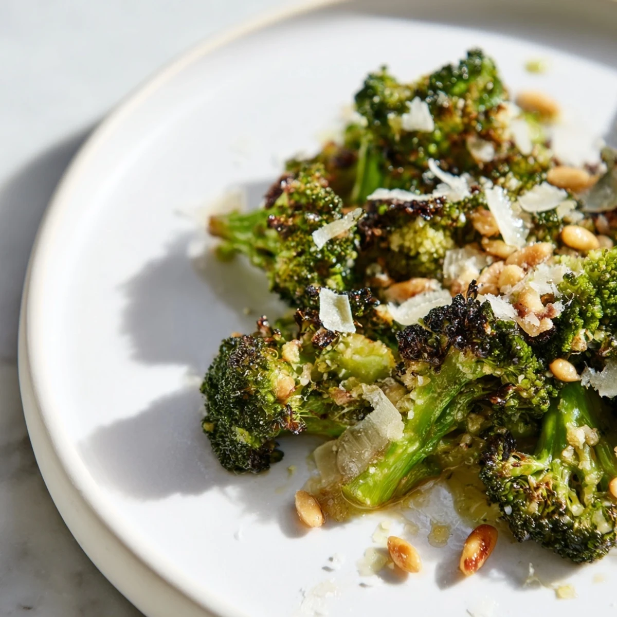 Beautifully charred broccoli salad with Parmesan, a flavorful and easy recipe.
