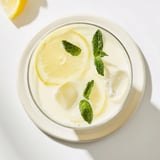 A refreshing pitcher of Creamy Lemonade Drink with a velvety texture, perfect for a sunny summer afternoon on the porch.