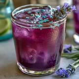 Cool lavender lemonade refresher with bright lemon, soothing floral notes, and a stunning purple color.