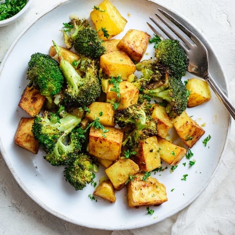Golden, crispy Roasted Lemon Potatoes and Broccoli, bursting with citrus and smoky paprika flavors.