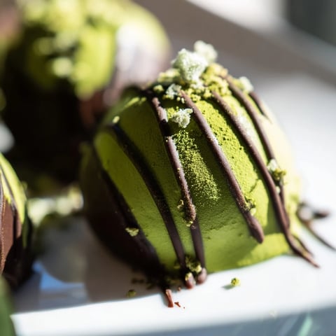 Bright green matcha coats these Matcha Dark Chocolate Peppermint Truffles, ready to deliver a refreshing burst of flavor.