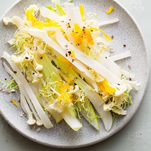A beautiful Tundra Trek: pale vegetables scattered across a cold stone, ready to serve and enjoy.